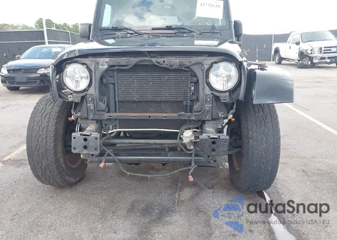 2015 Jeep Wrangler Sahara z USA, uszkodzony, nr VIN 1C4AJWBG4FL605659